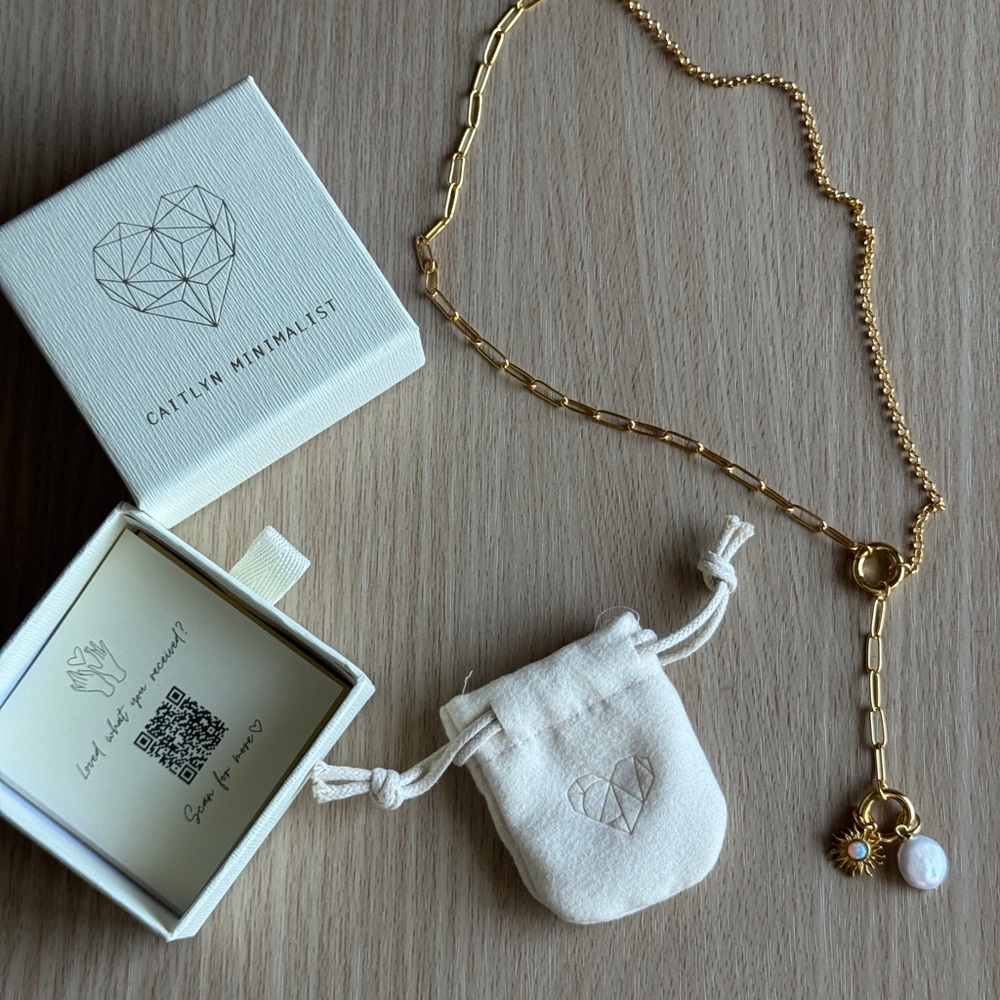 Gold Necklace with sun and pearl Charms